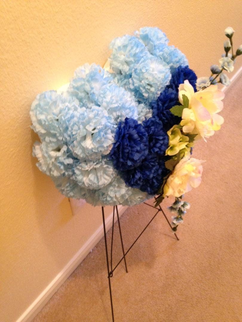 FLOWER Cemetery HEART on EASEL in Silk Blue Roses & Carnations for grave-site presentation in remembrance of loved ones. Easel Mounted